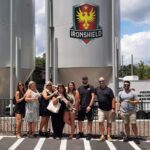 group outside ironshield brewery
