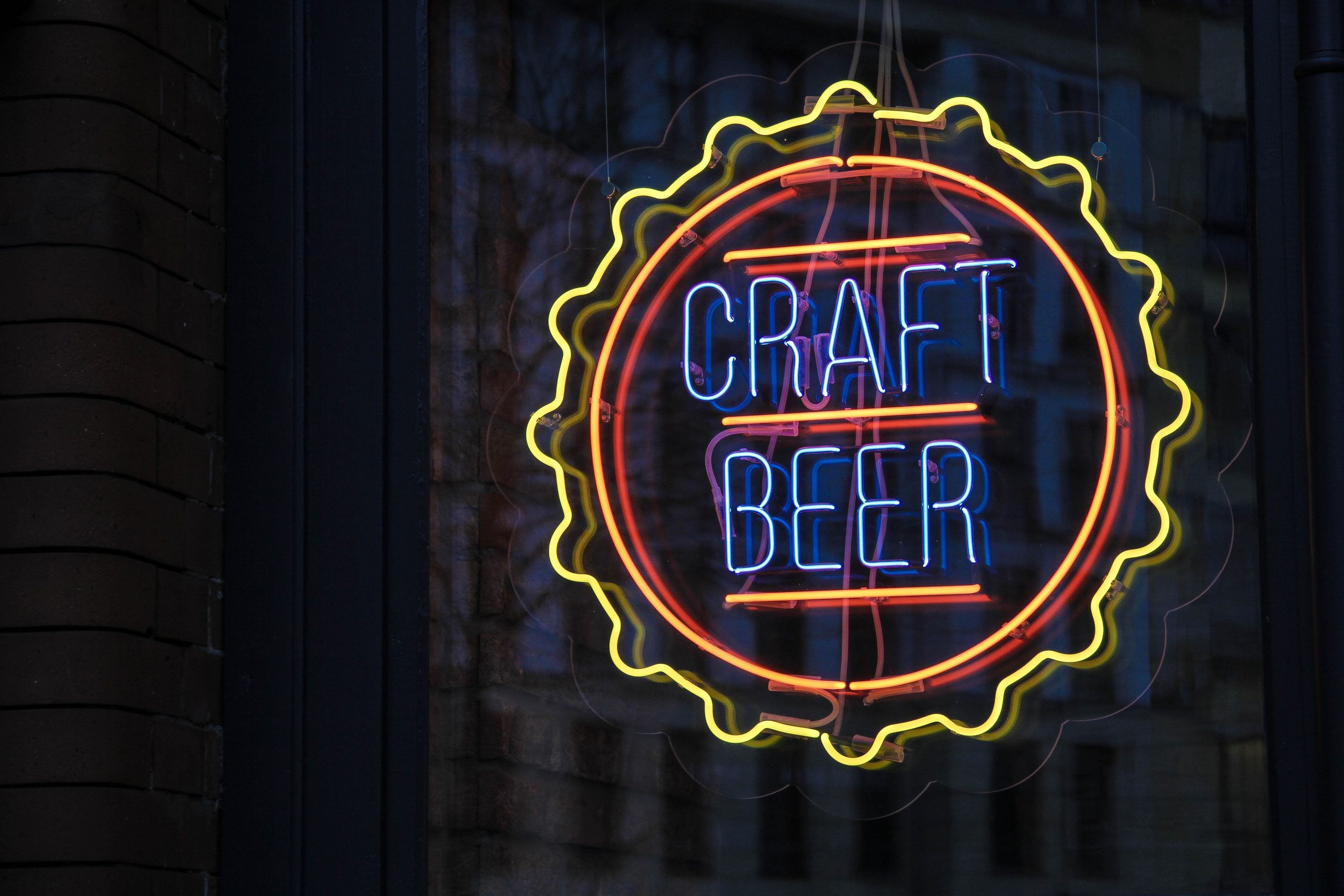craft beer neon sign inside brewery