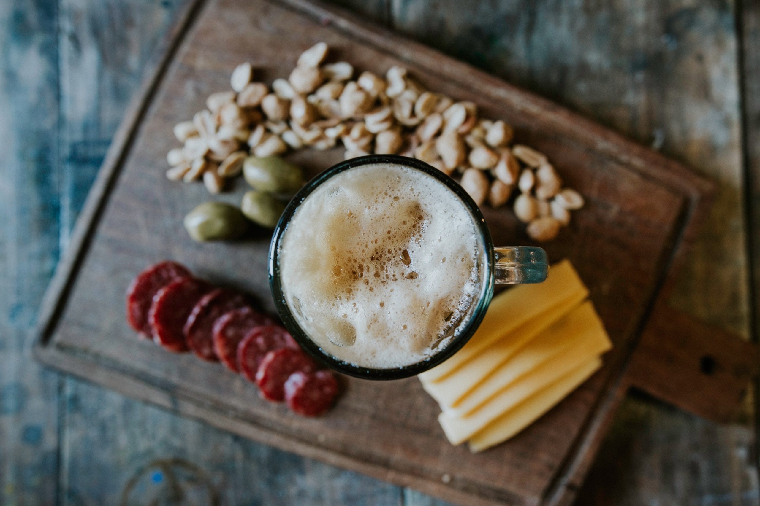 glass of beer paired with food